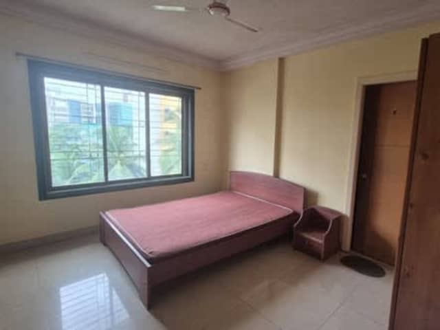 Single occupancy for girl in 2BHK furnished flat — living area and home amenities