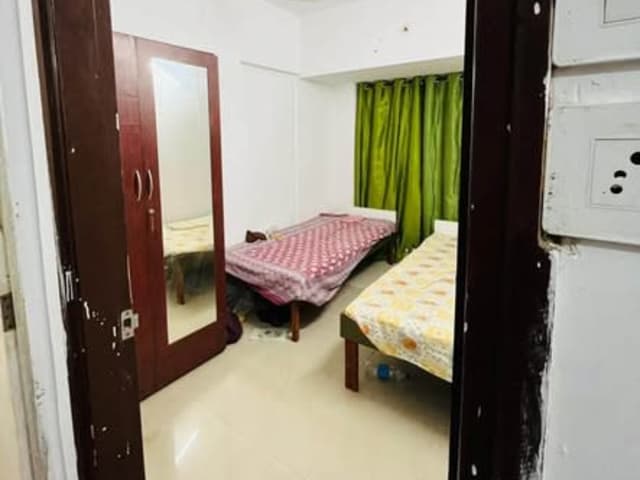 1BHK Full Furnished PG in Goregaon — living area and home amenities
