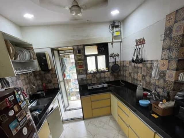 2 BHK Fully-Furnished in Goregaon East — living area and home amenities