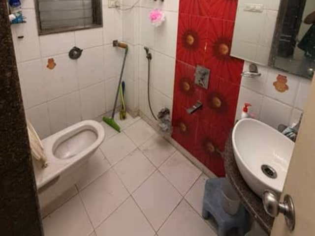 Master Bedroom in 3BHK Goregaon East — living area and home amenities
