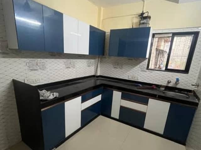 2BHK Unfurnished Flat in Andheri East — living area and home amenities