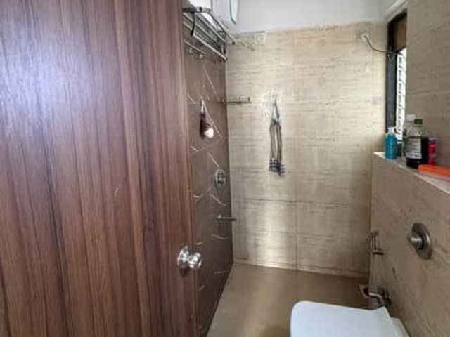 Flatmate needed in 2BHK semi-furnished flat — living area and home amenities