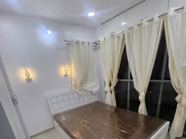 Fully Furnished Single Occupancy for Females in 2BHK — living area and home amenities