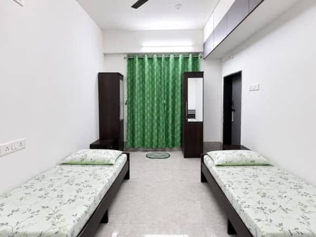 GIRLS PG IN BALEWADI — living area and home amenities