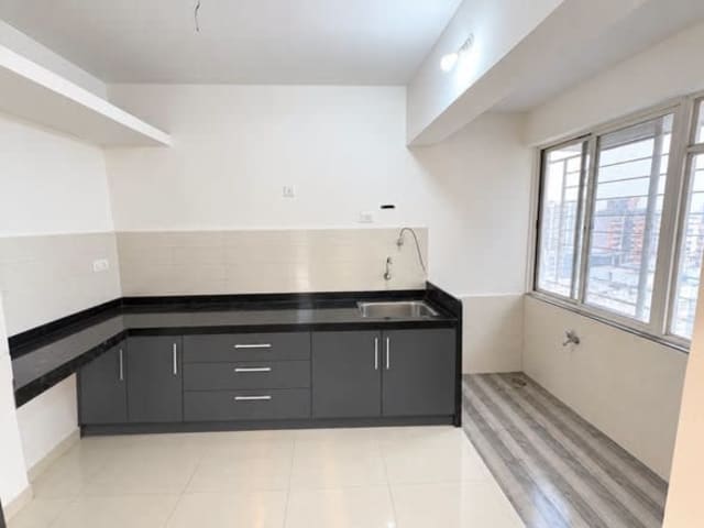 2 BHK Semi-Furnished Flat for Rent in Wakad — bedroom interior view