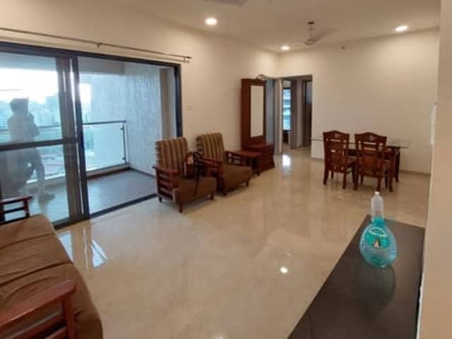 3 BHK ALMOST FURNISHED FLAT FOR RENT IN MJ OPERA SOCIETY, WAKAD — living area and home amenities