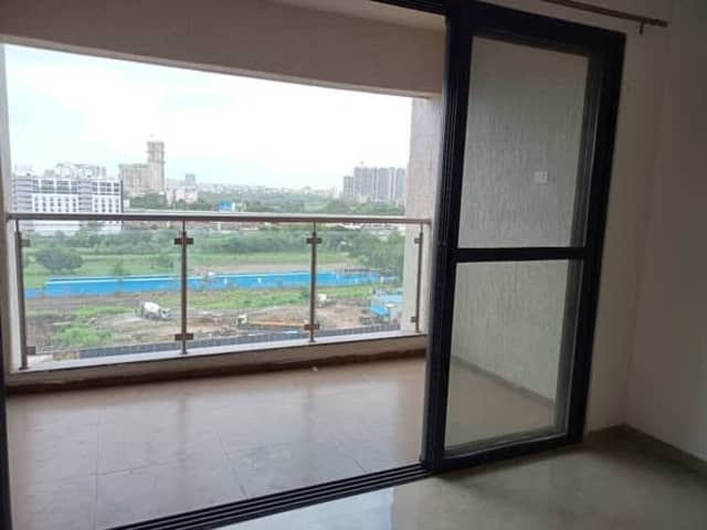 2 BHK Semi-Furnished in MJ Opera, Wakad — living area and home amenities