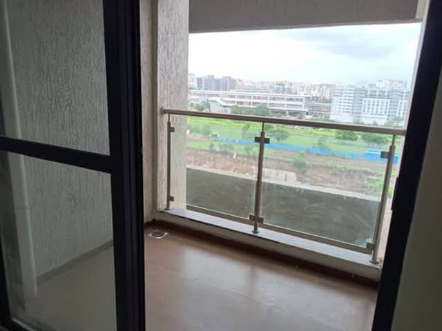 2 BHK Semi-Furnished in MJ Opera, Wakad — bedroom interior view