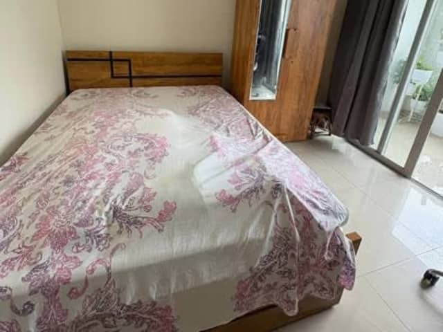 Spacious Room in Amanora Future Towers — bedroom interior view