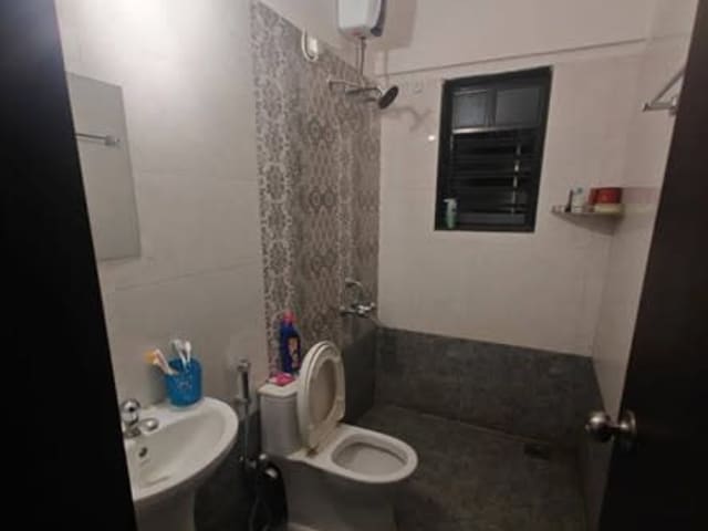 Single Room in Fully Furnished 3BHK in Balewadi — living area and home amenities