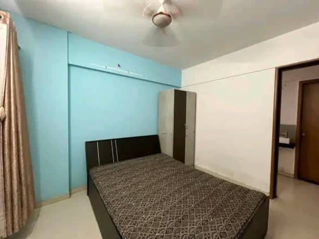 Fully Furnished Premium 2 BHK @ Kharadi — bedroom interior view