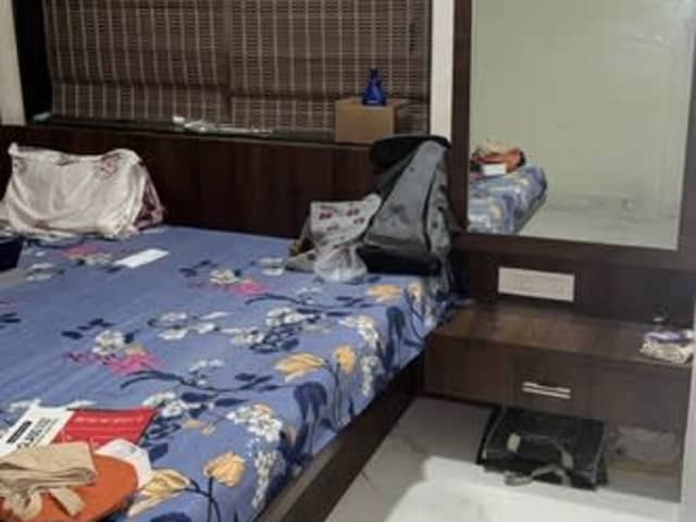 Fully Furnished Room for Rent in Wadgaonsheri, Pune — living area and home amenities