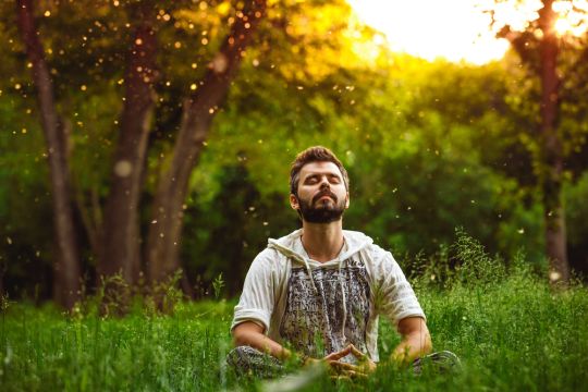 bearded-man-meditating-outside.jpg