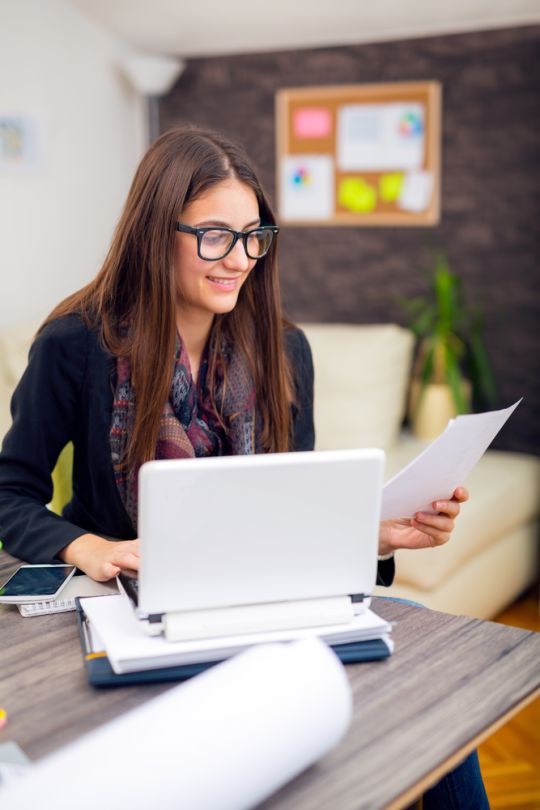 woman-glasses-desk-laptop-working.jpg