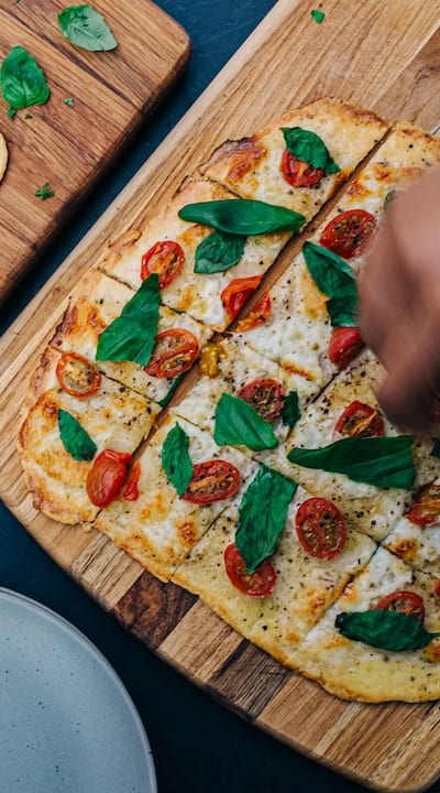 Companion planting: Basil repels pests from tomatoes.