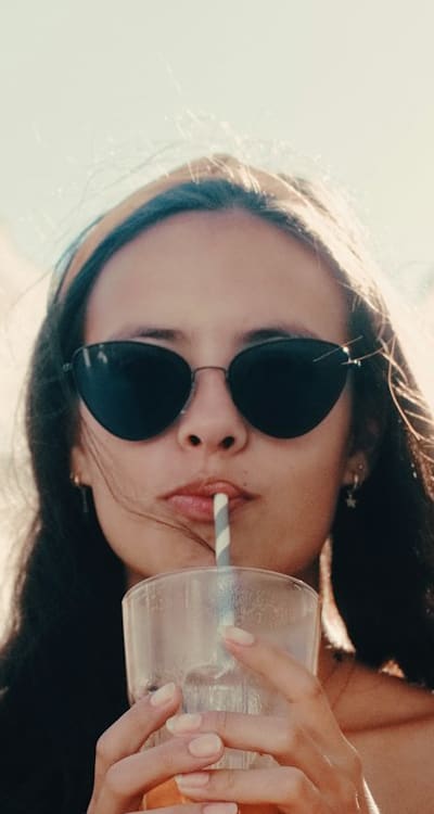 Alt text: Heirloom fruit plants protected by straw mulch.