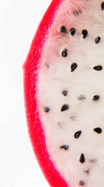 Preparing seed trays and sowing biennial flower seeds.