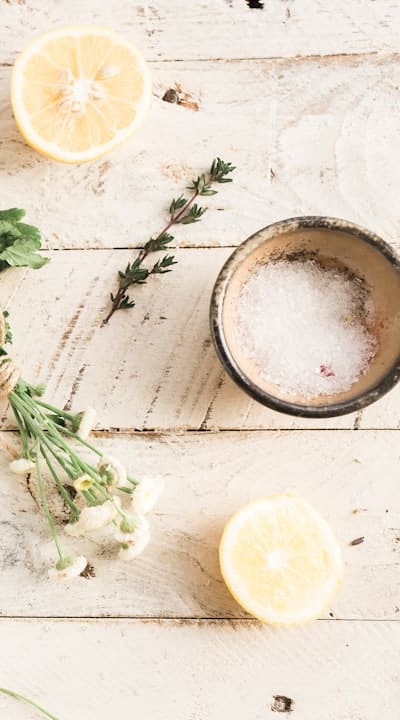 Healthy herb seedlings being hardened off outside.