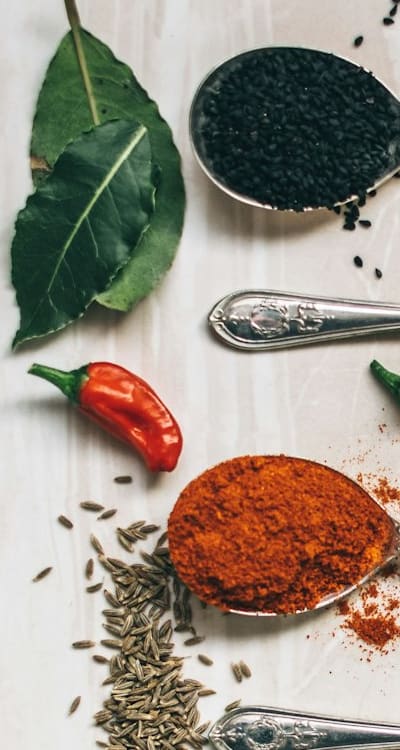 Alt text: A DIY soil pH testing kit with herbs