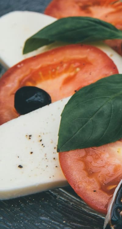 Preparing for successful tomato seedling transplantation in an organic garden.