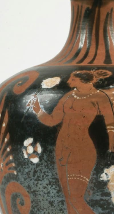 Arranging colorful dahlias in a stunning bouquet.