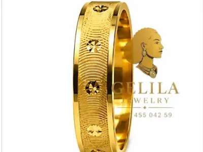A beautifully handcrafted 21K gold wedding ring featuring an elegant polished finish and timeless design. Perfect for weddings, engagements, anniversaries, or everyday wear.