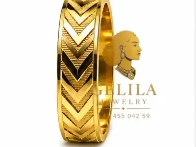 A beautifully handcrafted 21K gold wedding ring featuring an elegant polished finish and timeless design. Perfect for weddings, engagements, anniversaries, or everyday wear.