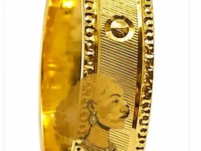 A beautifully handcrafted 21K gold wedding ring featuring an elegant polished finish and timeless design. Perfect for weddings, engagements, anniversaries, or everyday wear.