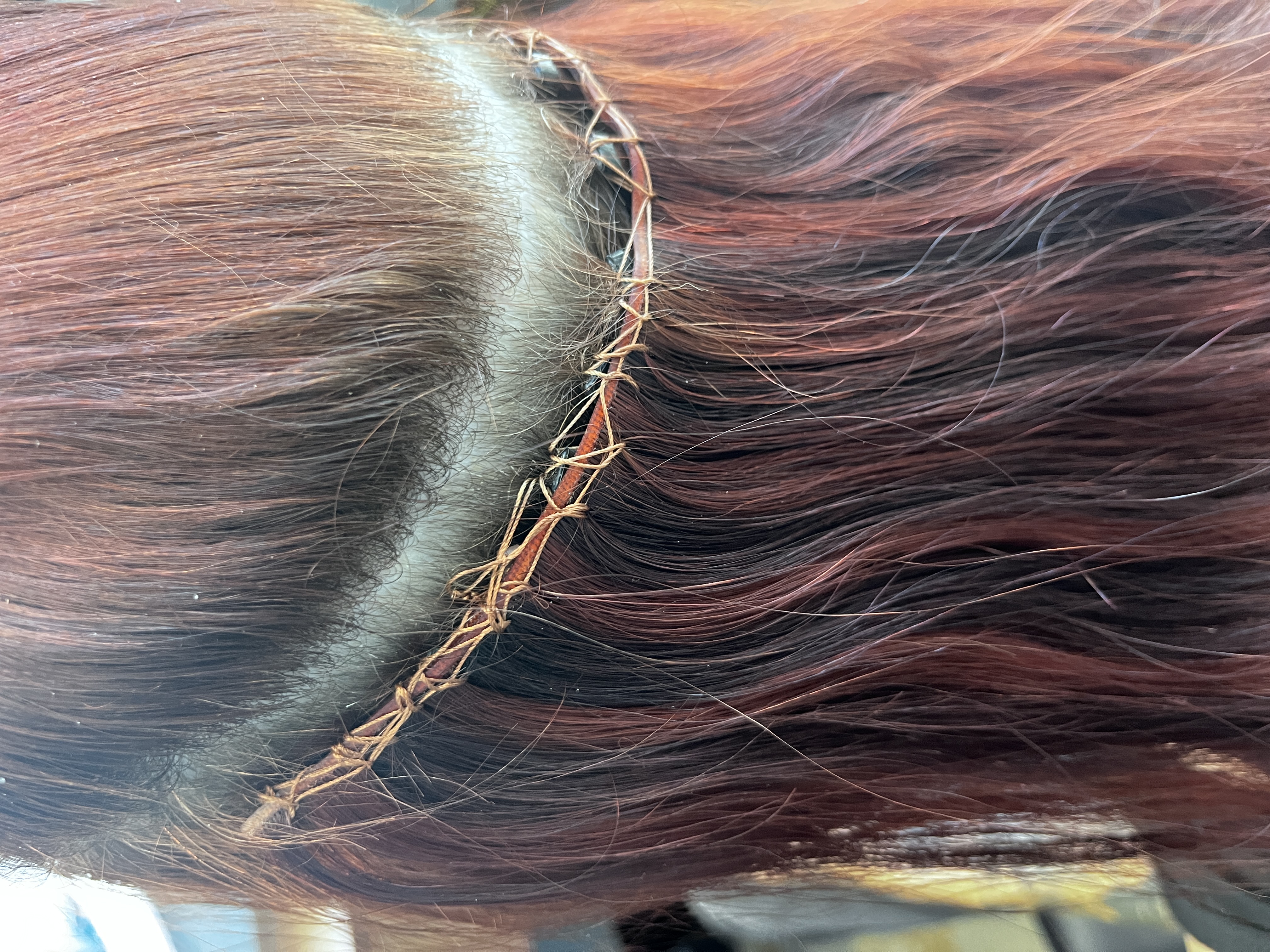 Failed beaded weft installation before removal