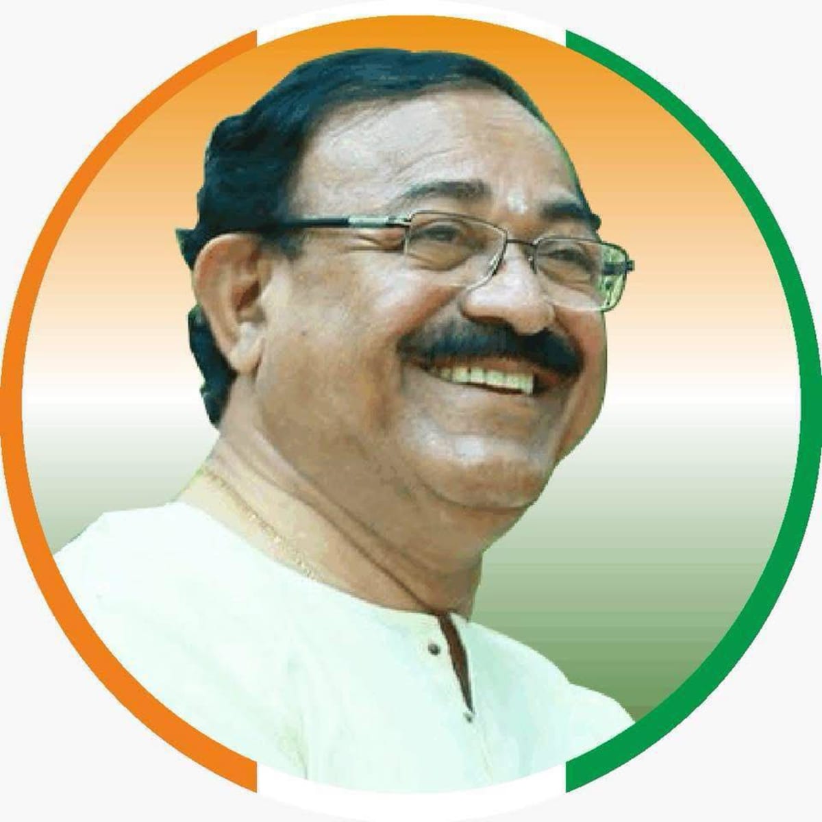 Cheppudira Arun Machaiah, smiling, framed by the colours of the Indian tricolour