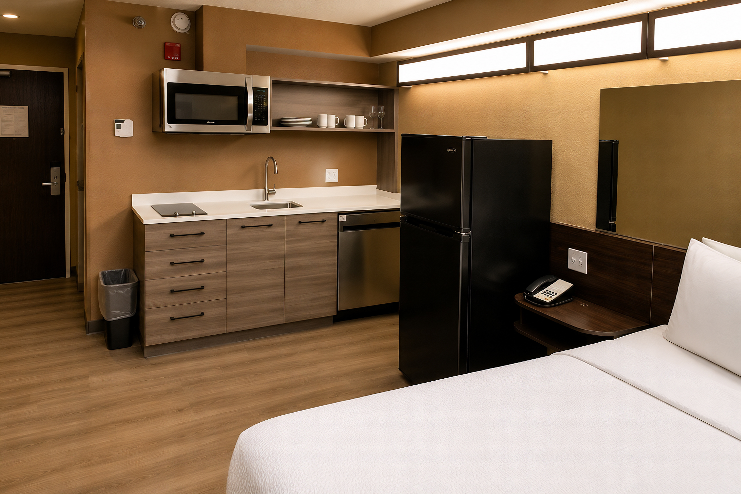 Microtel Williston Queen Kitchenette Suite with full kitchen, dishwasher and full-size refrigerator