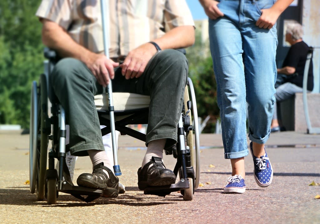 Image of support for disabled individuals.