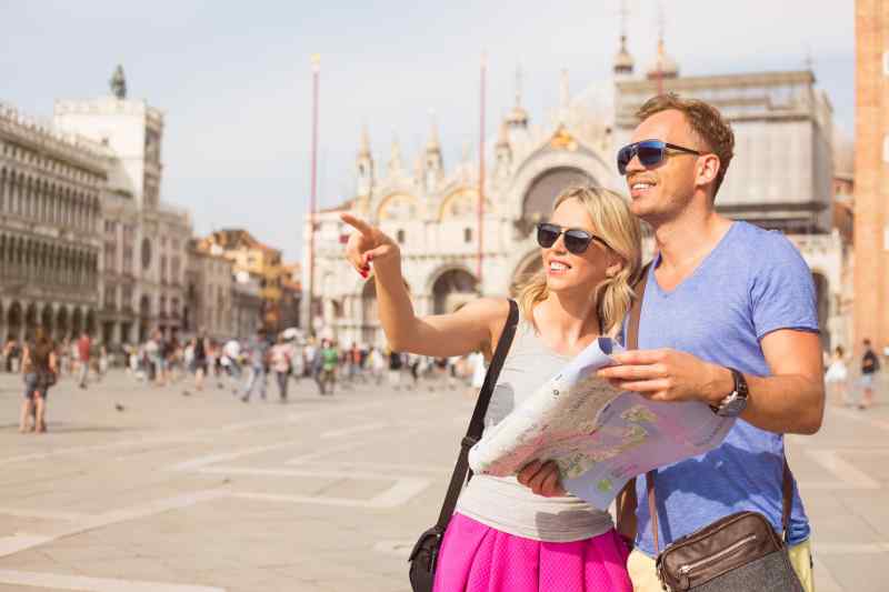 Italian tourists looking for directions