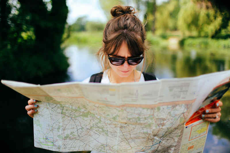 Person holding a map