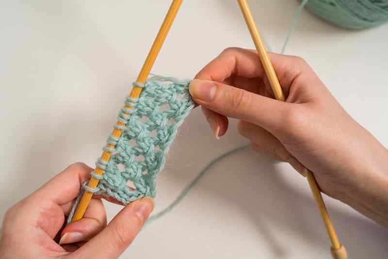 Hands knitting.