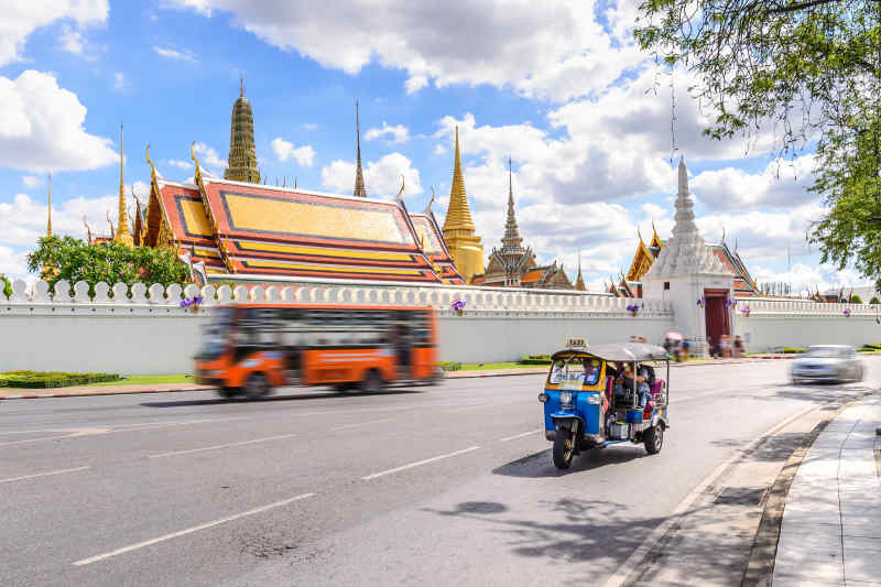 Tuk Tuk and City Bus in Bangkok