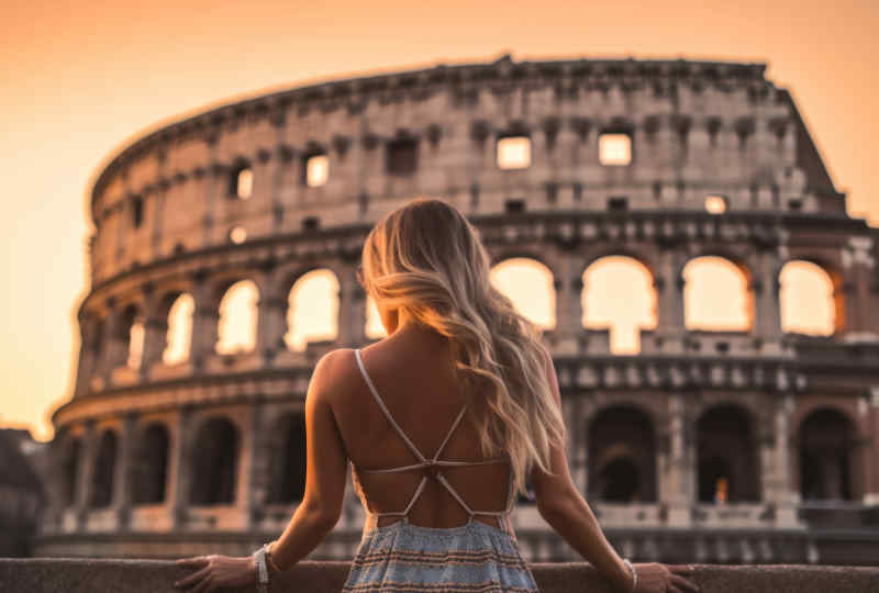 Tourist visiting the Colosseum in Rome, Italy