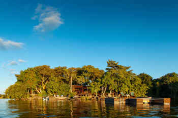 Jicaro Island Lodge • View of lodge from lake