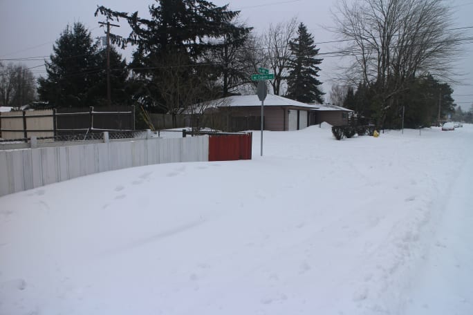 A street corner covered in snow