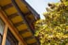 Looking up at the underside of a roof from outside
