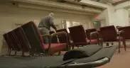 a man setting up a homeless shelter