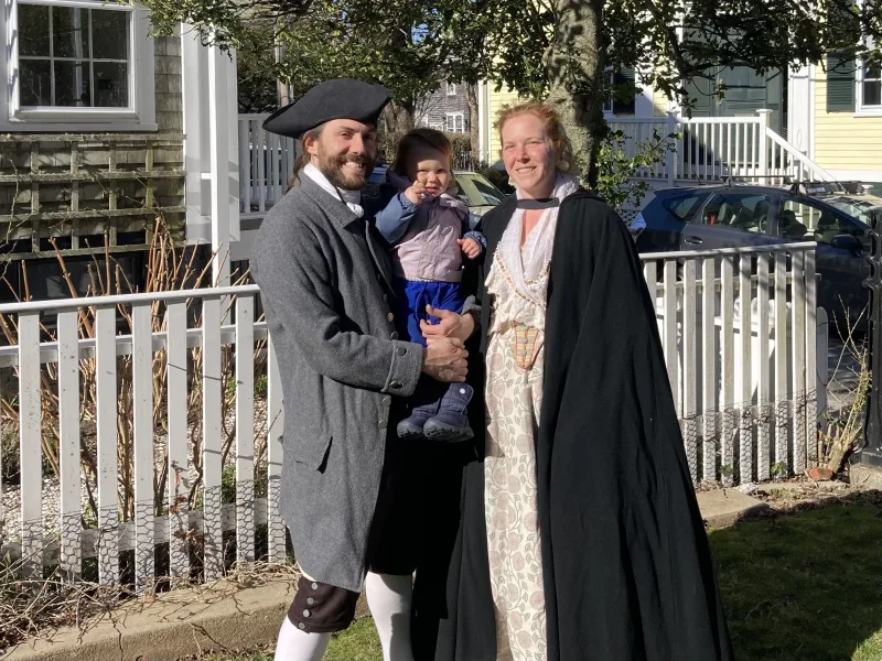 family in costume on set