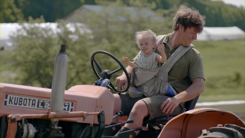 baby on tractor