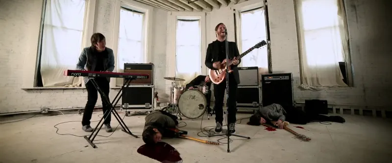 wide shot of band during music video