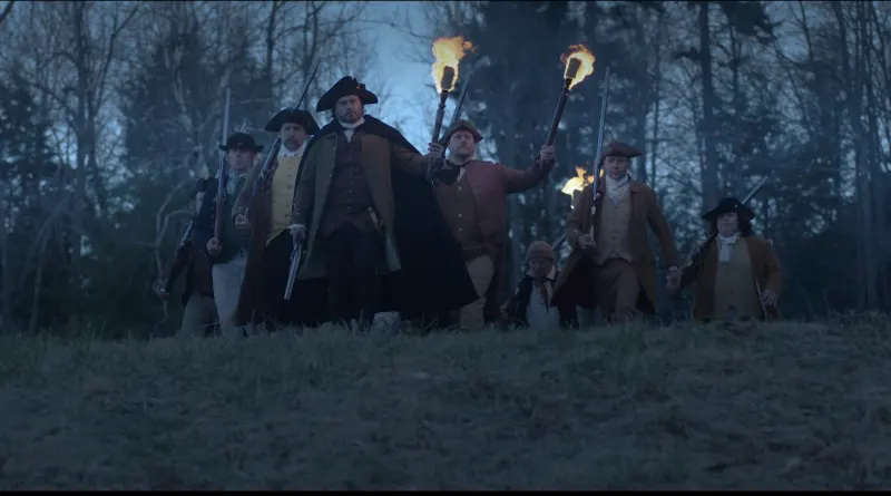 Ethan Allen leads men with torches