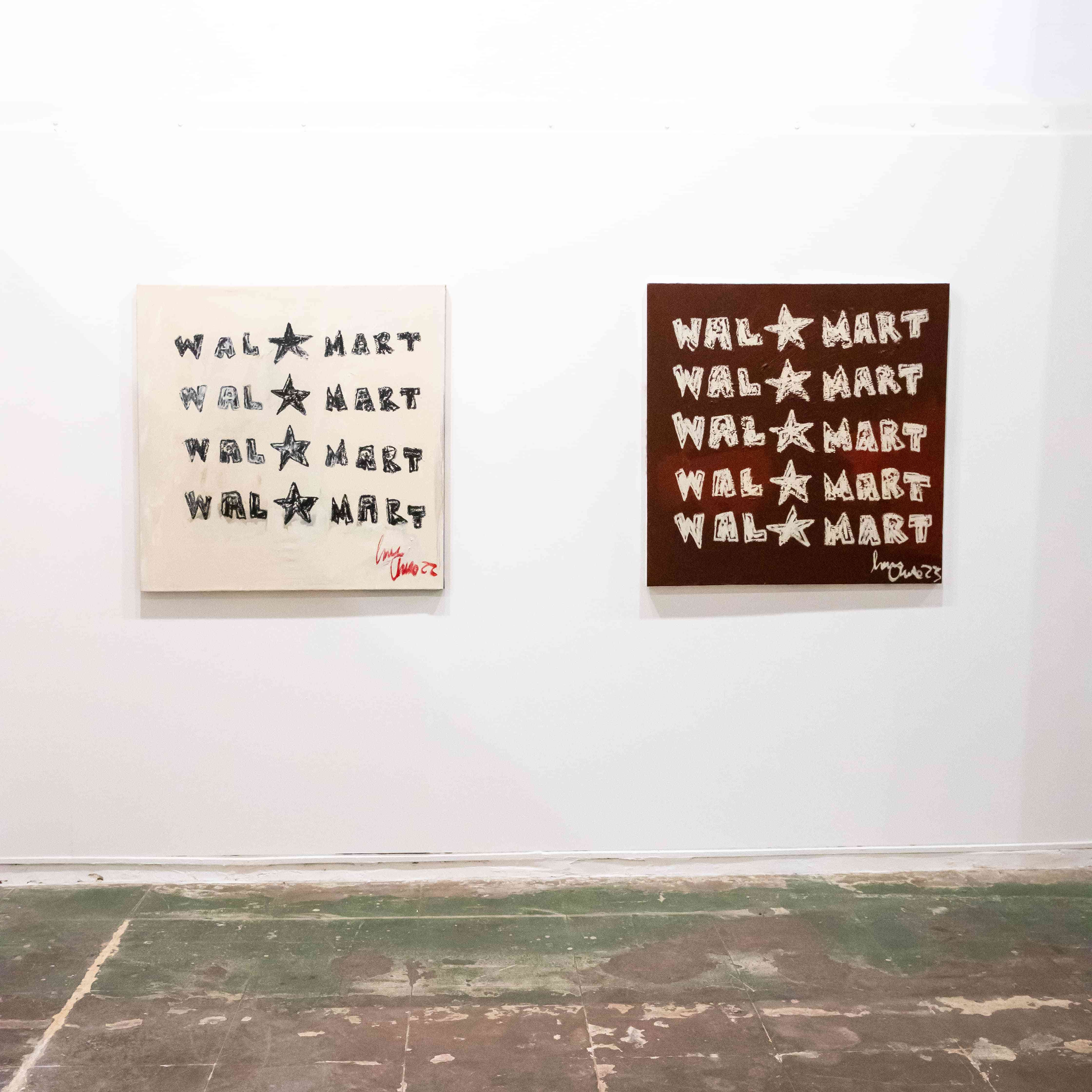 Two canvas paintings hanging on a gallery wall