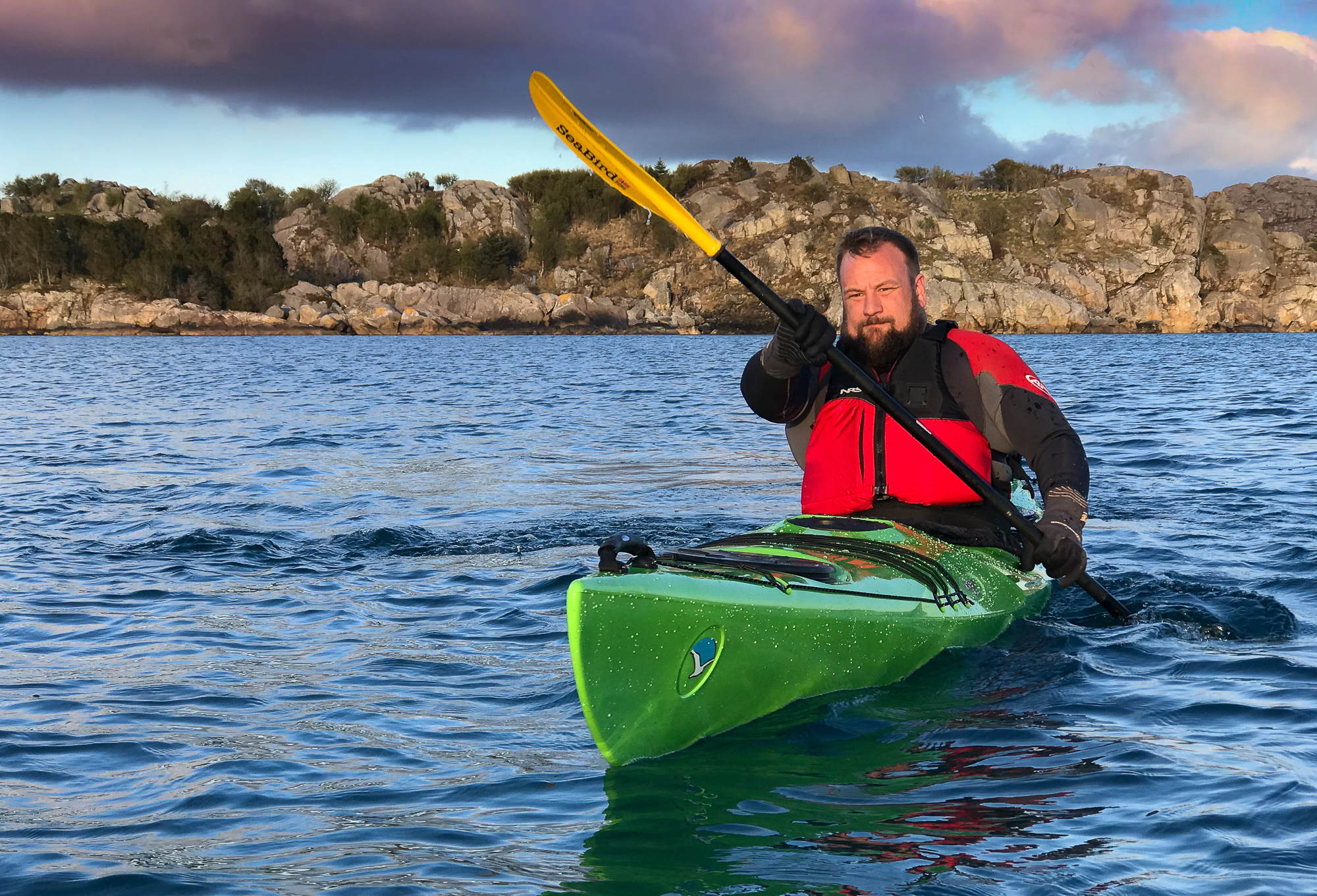 Cluster of sea kayaks  Introkurs för kajakledare