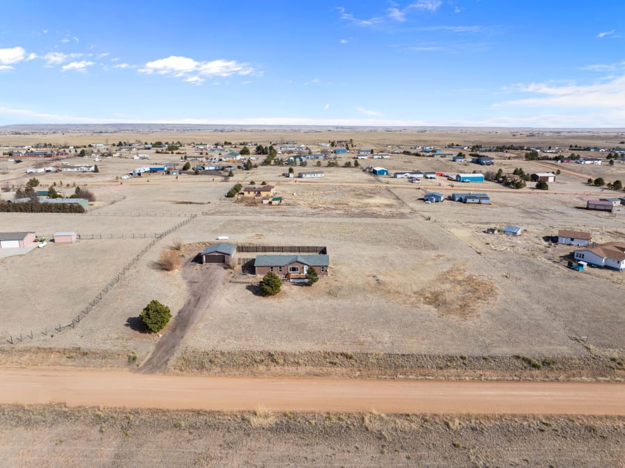 Property on Peerless Farms Rd in Peyton, CO, photographed by Harrison Christopher