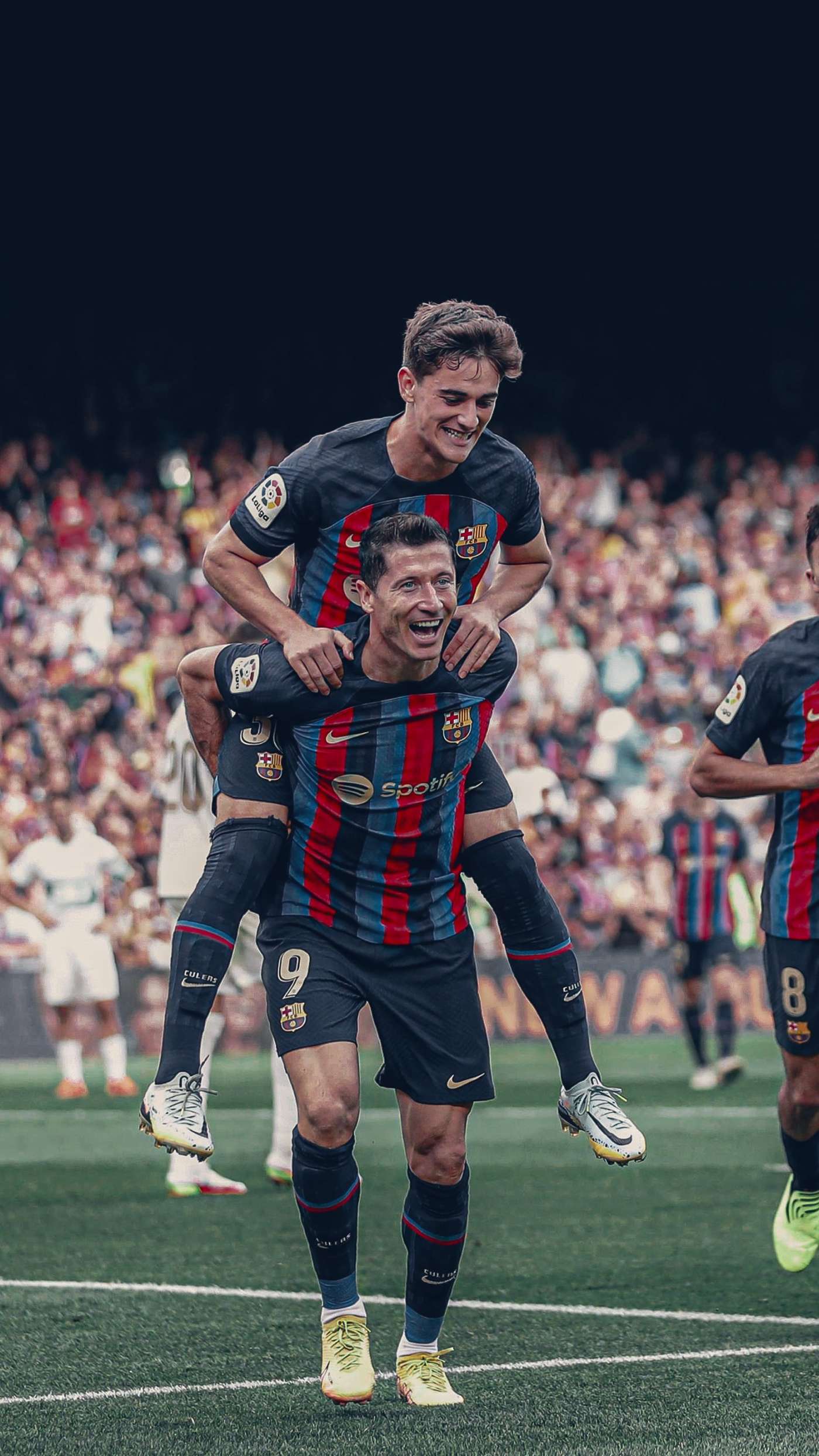 Lewandowski Gavi Piggyback Celebration — phone wallpaper preview