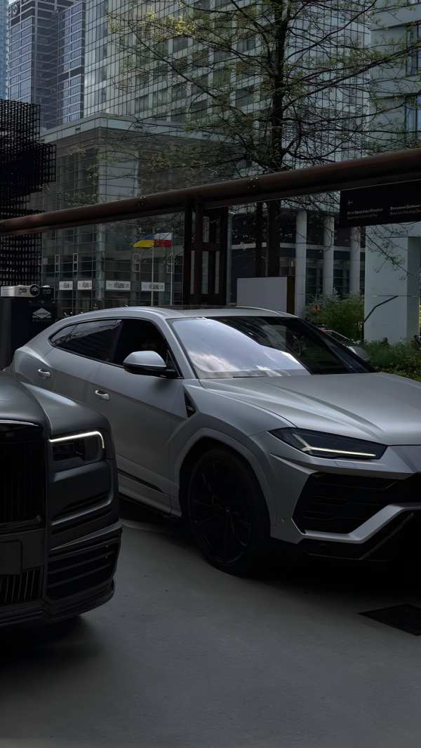 Luxury SUVs in Modern City — phone wallpaper